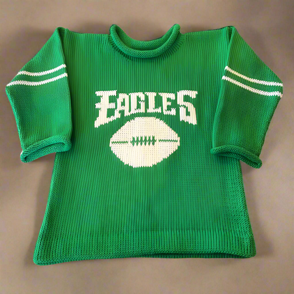 Personalized Philadelphia Eagles baby sweater in green and white with custom name, laid flat on a soft background, perfect for NFL game day