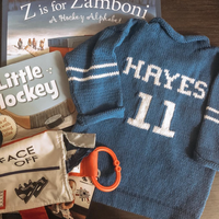 Personalized baby varsity sweater with custom name in soft knit cotton—perfect as a baby gift, baby shower gift, or toddler clothes essential