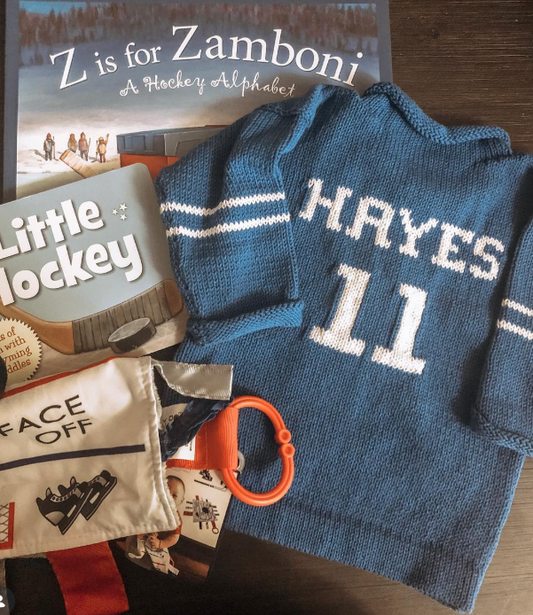 Personalized baby varsity sweater with custom name in soft knit cotton—perfect as a baby gift, baby shower gift, or toddler clothes essential